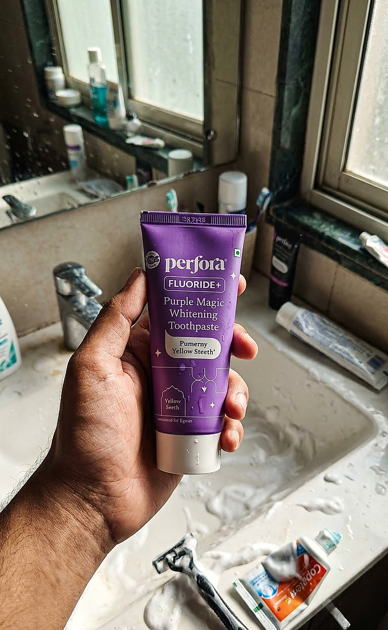 Ritu Mukherjee holding Perfora Purple Magic Whitening Toothpaste