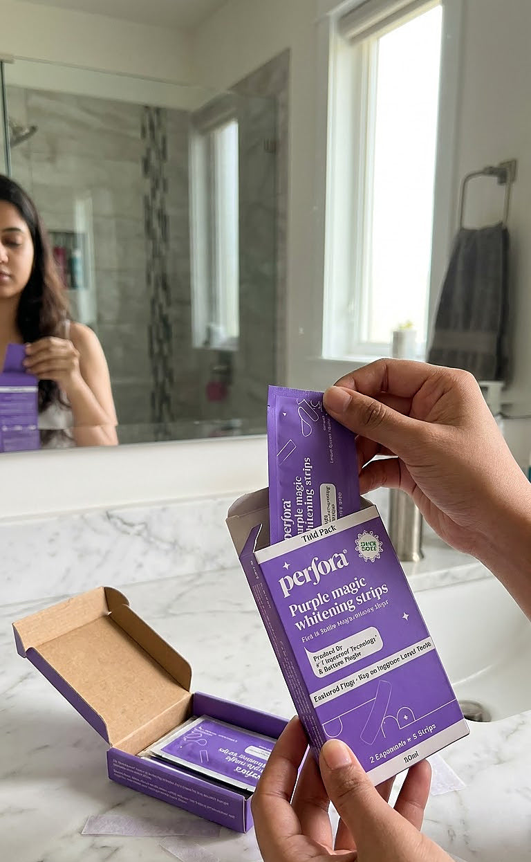Pallavi Bose holding Purple Teeth Whitening Strips