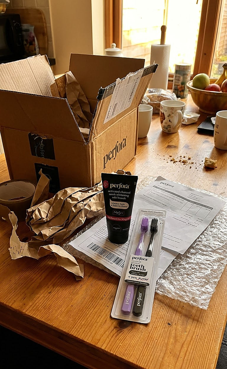 Rohan Mehta holding Activated Charcoal Toothpaste & Brush Duo