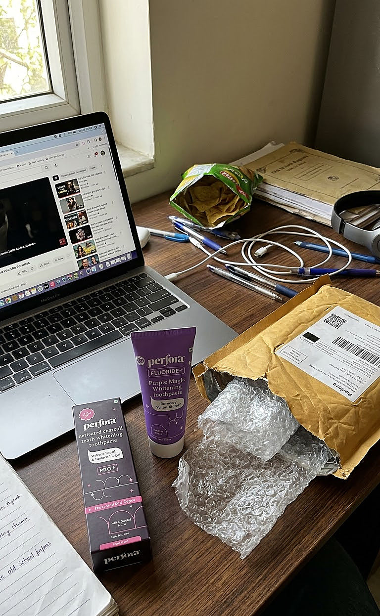 Vikram Singhania holding Perfora Purple Magic Whitening Toothpaste