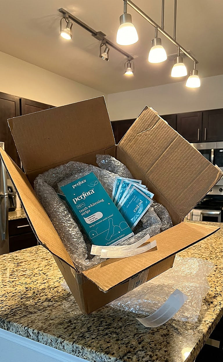 Suresh Iyer holding Teeth Whitening Strips (Classic Mint)