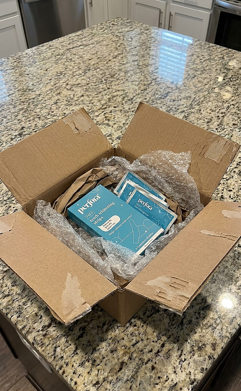Vivek Murthy holding Teeth Whitening Strips (Classic Mint)