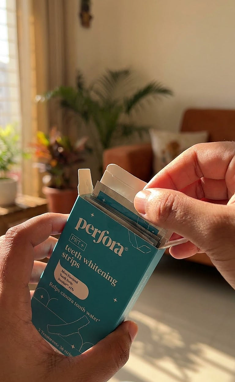Pooja Agarwal holding Teeth Whitening Strips (Classic Mint)
